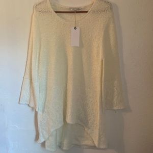 Size large cream colored tunic style dress. New with tags.